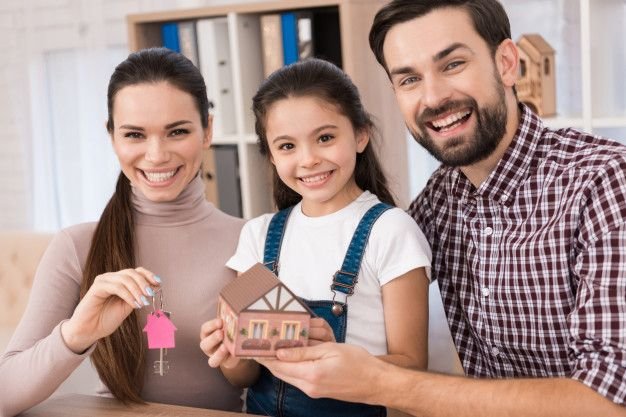 young family is happy to buy new house premium photo
